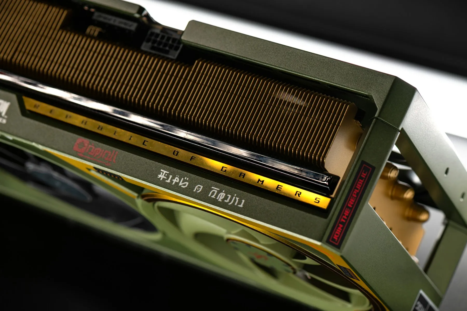 A high-performance graphics card with illuminated cooling fans